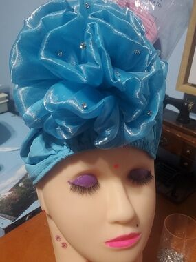 Turquoise Headwrap with Teardrop Jewel Accents & Rhinestones On The Flower.